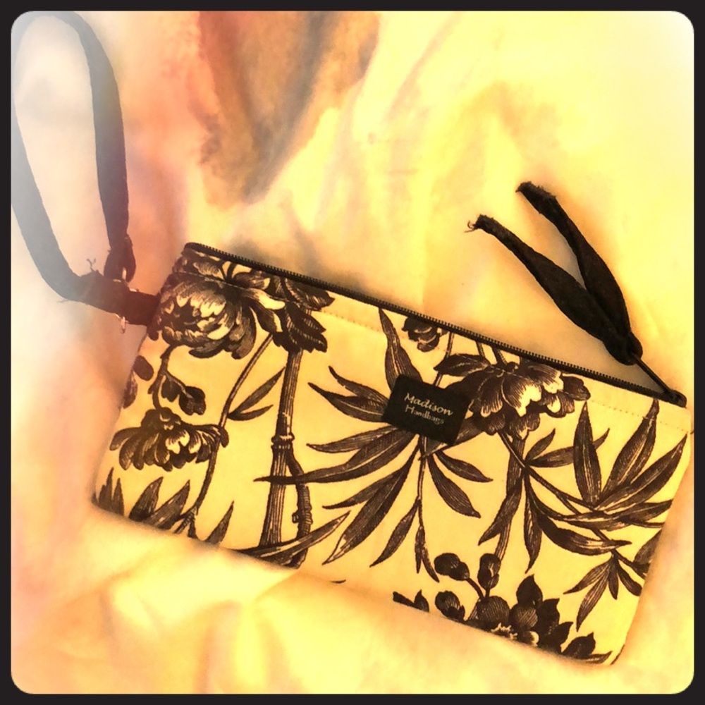Cute black and cream floral wristlet.